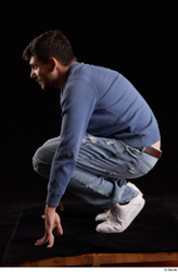 Whole Body Man White Sweatshirt Jeans Slim Kneeling Studio photo references